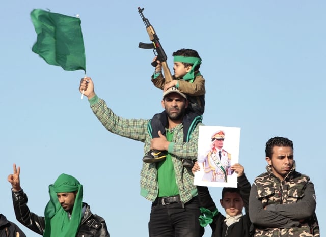 West strikes deep in Libya, NATO to take command