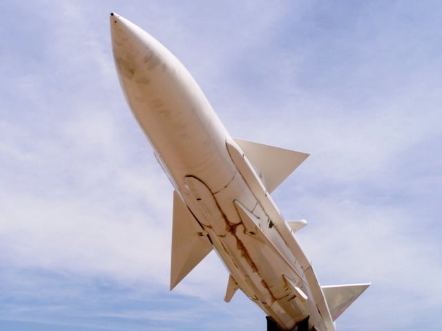 Iran test fires 14 missiles