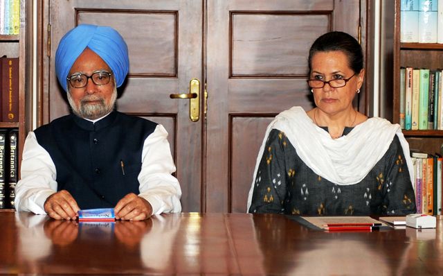 Embattled Indian PM keeps top team in reshuffle