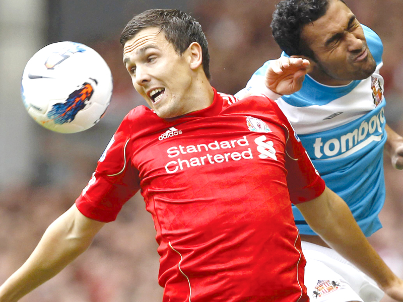 Football: Dalglish reiterates Suarez support