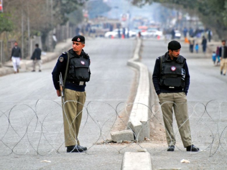 Police stand guard on the main routes leading to the Governor House. PHOTO MUHAMMAD IQBAL/EXPRESS