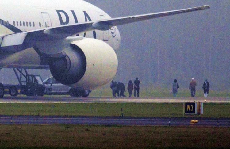A file photo shows a PIA aircraft at an airport. PHOTO: AFP/ FILE