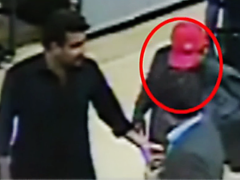 A screen grab from the CCTV footage that shows Shahrukh Jatoi being escorted through Karachi airport. PHOTO: EXPRESS