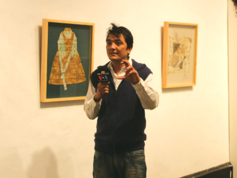 Ramazan Jafri talking to the press during the NCA thesis display 2013