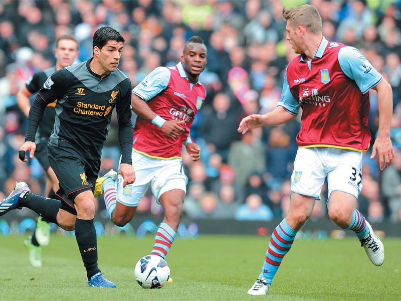 Liverpool came from a goal behind to beat relegation-troubled Aston Villa 2-1 yesterday. PHOTO: AFP