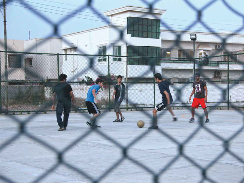 While residents have complained of the noise coming from the futsal ground in DHA Phase VI, young men have been glad for having an recreational venue. PHOTO: AYESHA MIR/EXPRESS