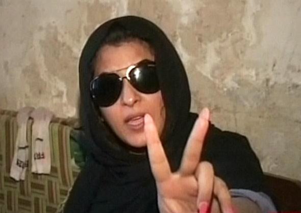 A screengrab shows Laila's gestures as she sits at the police station in Multan. SCREENGRAB: EXPRESS NEWS