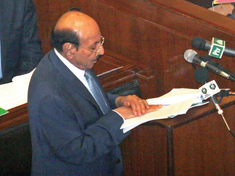 Third-time Chief Minister Syed Qaim Ali Shah announcing the Sindh Budget 2013-14 in the assembly on Monday. PHOTO: ATHAR KHAN/EXPRESS