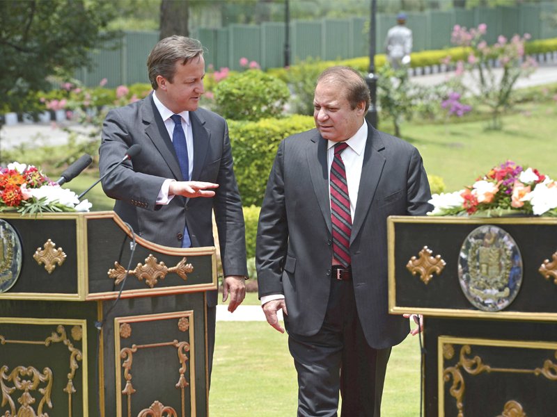 British Prime Minister David Cameron and Prime Minister Nawaz Sharif ahead of their joint news conference in Islamabad. PHOTO: REUTERS