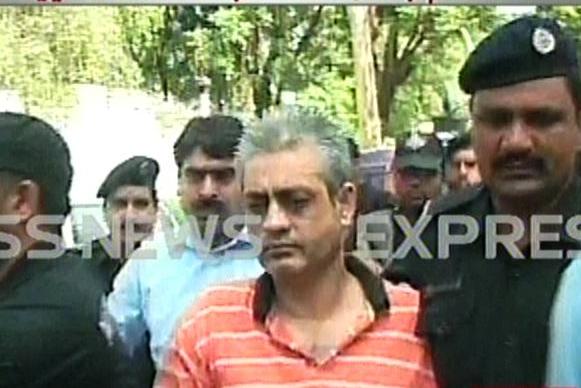 Screenshot showing Tauqir Sadiq being taken to the court.