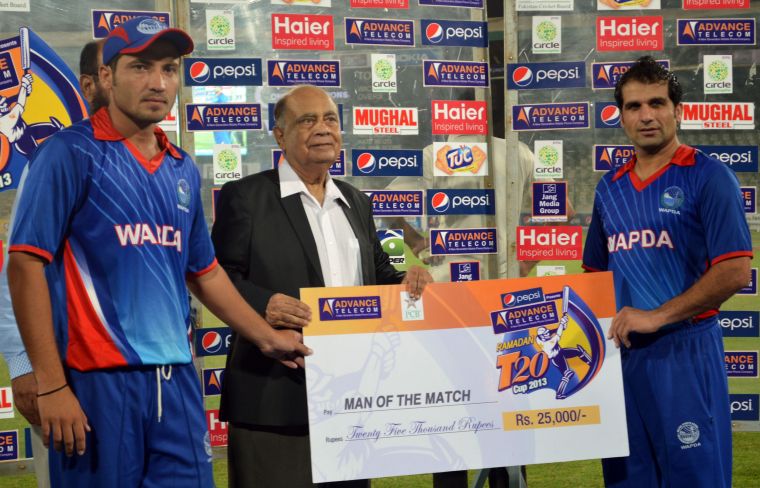 WAPDA's Mohammad Ayub and Asif Ali receive the Man of the Match award in their Ramazan T20 Cup match against UBL. PHOTO: PCB