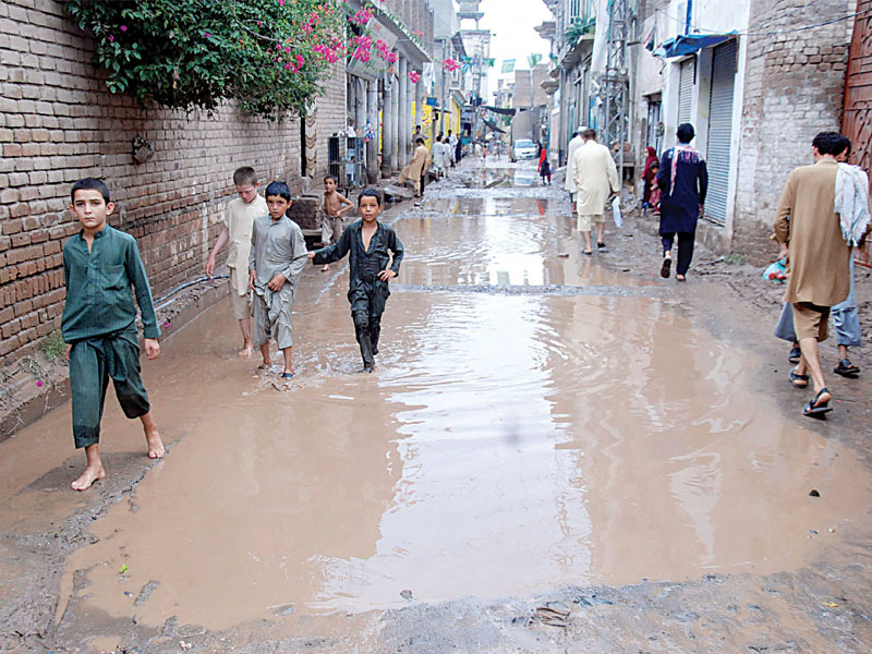 Residents say floodwater in some residential areas is nearly four feet deep and sewerage lines have been blocked. PHOTO: EXPRESS