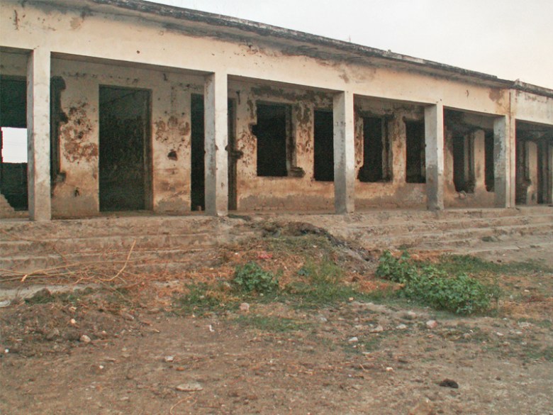 Protests over the location of Girls High School Mayar in the 90s led to its current condition -- an abandoned building illegally housing livestock. PHOTO: BASEER QALANDAR/EXPRESS