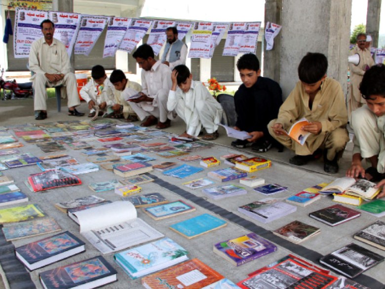 Residents of Matta vowed to strive to earn a positive name for the area where people would choose books over guns. PHOTO: EXPRESS