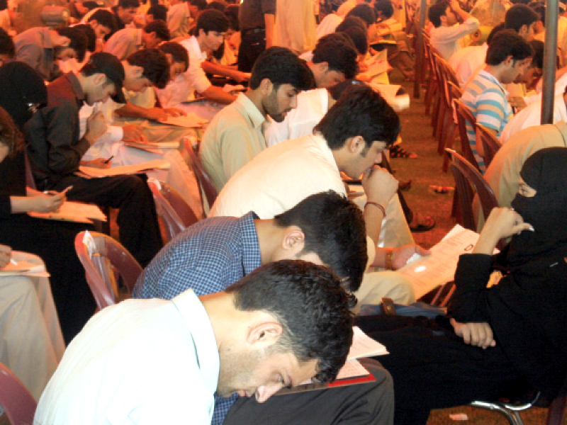In the provincial capital 11,748 students appeared for the test held at Islamia College University and Khyber Medical College sports ground. PHOTO: IQBAL MAMOND/EXPRESS