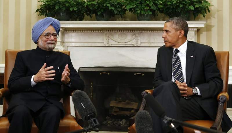 Indian Prime Minister Manmohan Singh (L) speaks as US President Barack Obama looks on, during their meeting in the Oval Office of the White House in Washington September 27, 2013. PHOTO: REUTERS