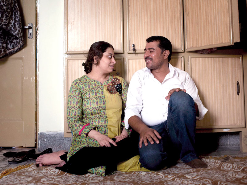 Adil tries to reassure Suha at their home in Rawalpindi. PHOTO: MYRA IQBAL/EXPRESS