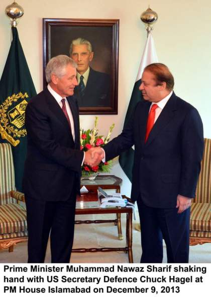 US Secretary of Defence Chuck Hagel shakes hands with Prime Minister Nawaz Sharif in Islamabad on Monday. PHOTO: PID