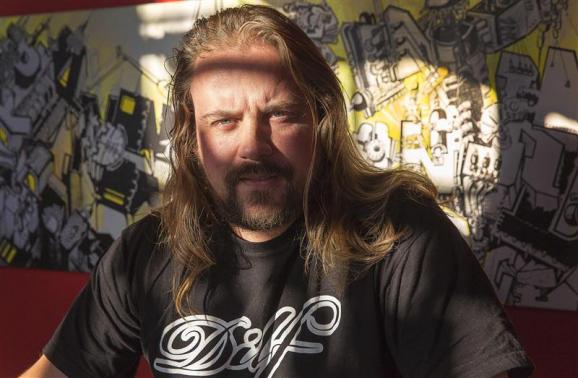 Tattoo shop owner Peter van der Helm poses in his tattoo studio in Amsterdam December 10, 2013. PHOTO: REUTERS