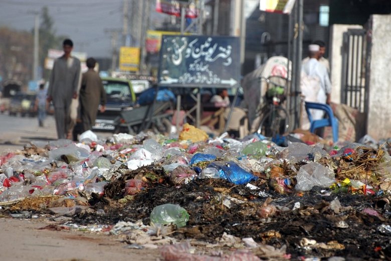 Nearly 400,000 tons of trash is collected each year from the twin cities, according to official statistics. PHOTO: QAZI USMAN