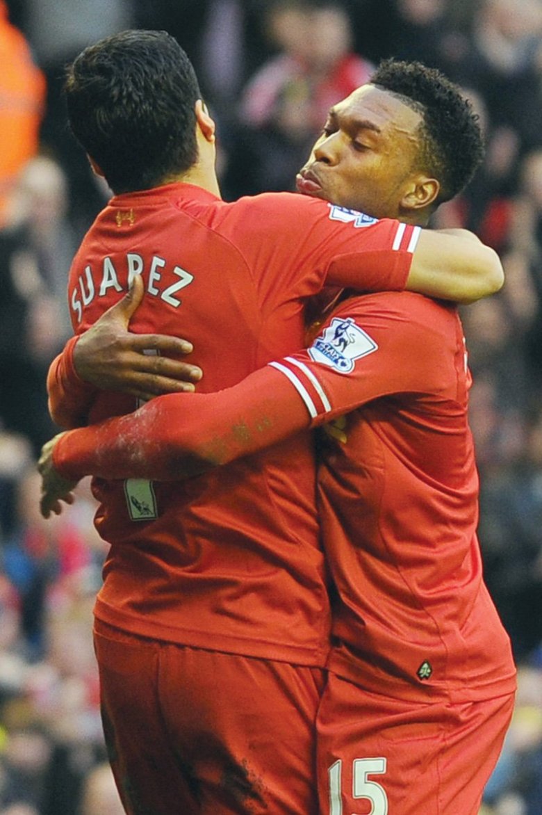 Rodgers is against curbing Liverpool’s attacking ways that have allowed Luis Suarez and Sturridge to emerge as the league’s top two scorers. PHOTO: AFP