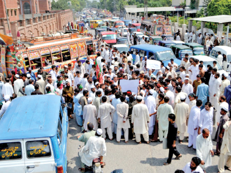 People protesting. PHOTO: INP
