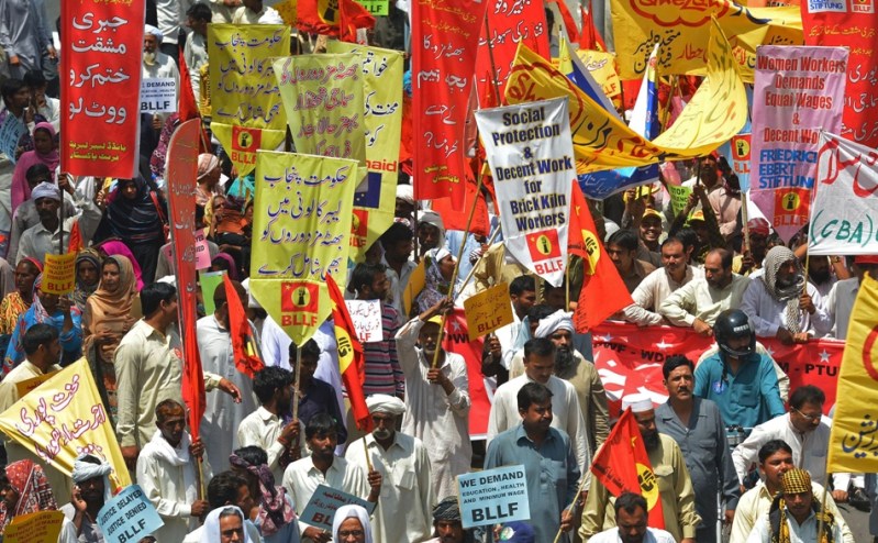 Pakistani labour unions workers march during a May Day rally to mark International Labour Day in Lahore. PHOTO: AFP
