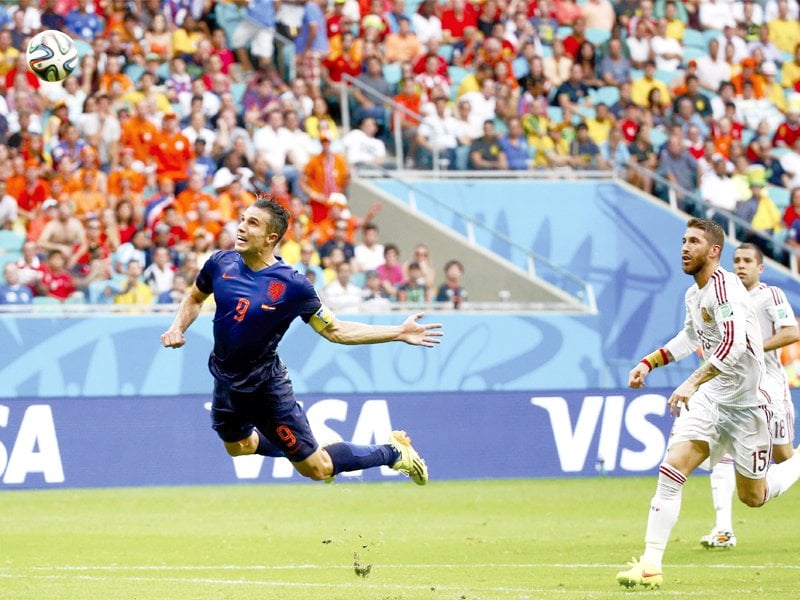 Robin van Persie silenced the critics who claimed Netherlands did not have enough fire power to defeat Spain. PHOTO: REUTERS