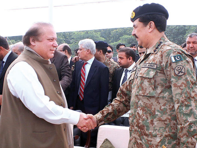 Prime Minister Nawaz Sharif shakes hands with army chief General Raheel Sharif at the passing out of the first batch of Punjab’s Counter-Terrorism Force. PHOTO: APP