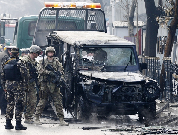 US soldiers arrive at the site of a suicide attack in Kabul. A suicide bomber rammed a vehicle laden with explosives into a Turkish embassy car in the Afghan capital on Thursday, killing at least one person inside, the ministry of interior said. PHOTO: REUTERS
