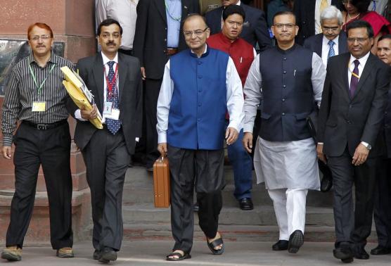 India's Finance Minister Arun Jaitley (C) leaves his office to present the 2015/16 federal budget in New Delhi February 28, 2015. PHOTO: REUTERS
