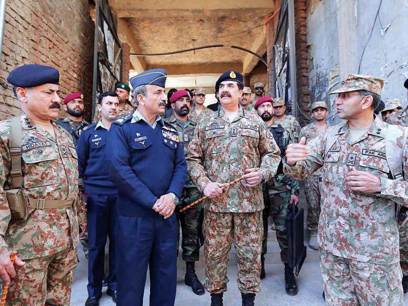 General Raheel Sharif and Air Chief Marshal Tahir Rafique Butt visit an army post in Miranshah, North Waziristan. PHOTO: APP