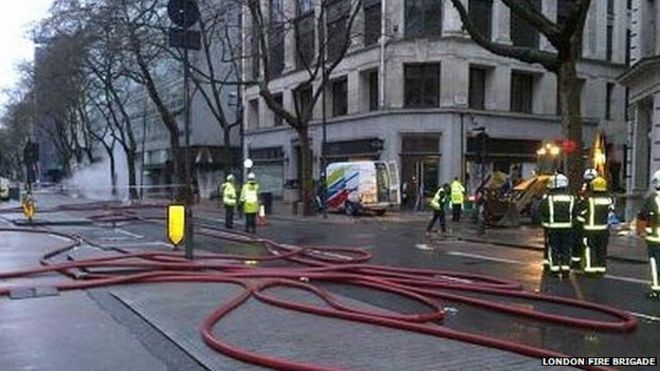 As flames erupt from manhole cover, the London Fire Brigade sent 10 engines and 70 crew to scene. PHOTO COURTESY: BBC