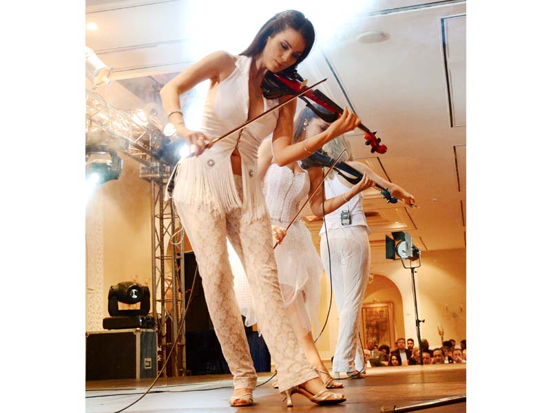 Clad in pristine white dresses, the violin-slinging women opened the concert with Brahm’s Hungarian Dances. PHOTO: HUMA CHOUDHARY