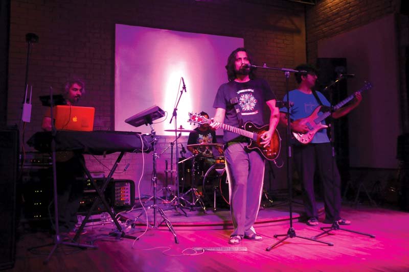 The band performed a few classics at the unveiling ceremony in Lahore. PHOTO: MALIK SHAFIQ/EXPRESS