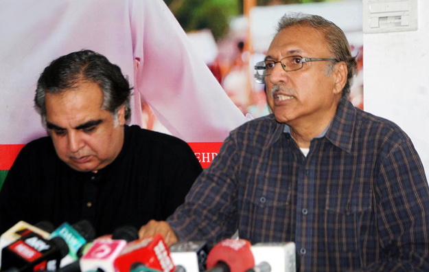 MNA and Leafer of Pakistan Tehreek-e-Insaaf Arif Alvi addressing a press conference at his residence. PHOTO: ONLINE