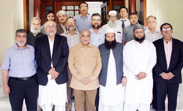 Group photo of Punjab Chief Minister Shahbaz Sharif with Board of Trustees of Tayyip Erodgan Hospital in Muzzafargarh. PHOTO: INP