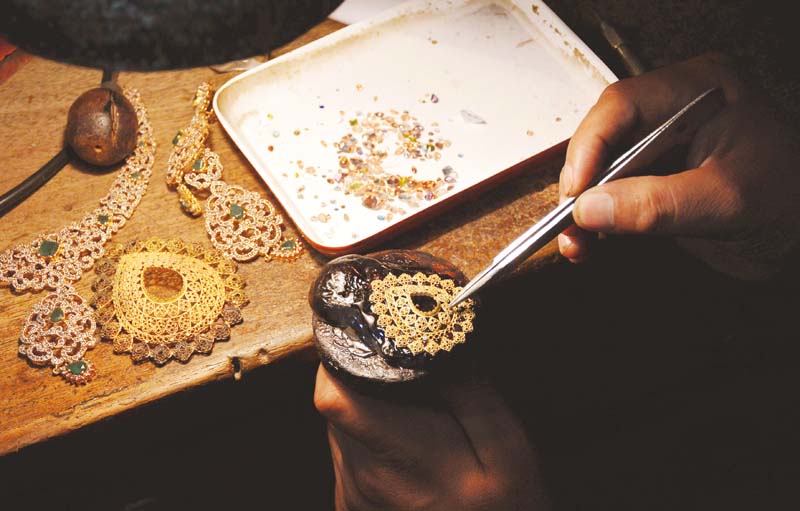 Stones being set in a piece of jewellery.  PHOTOS : HUMA CHOUDHARY