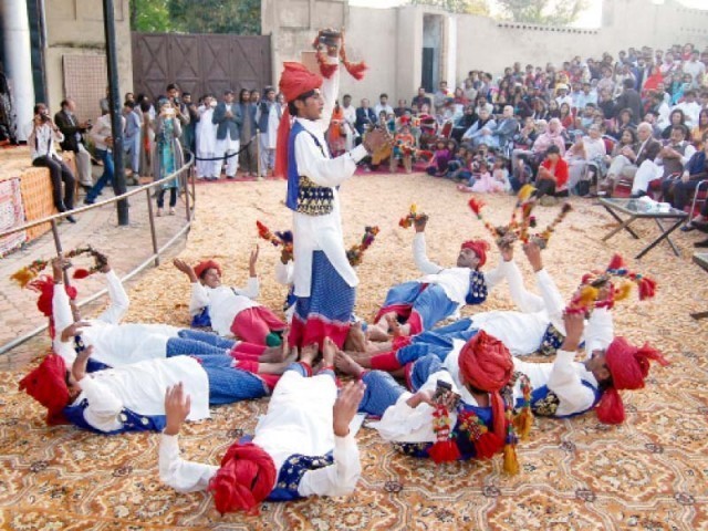 A file photo of Lok Virsa Mela from April 5th 2015, visitors enjoying a dance performance. PHOTO: MUHAMMAD JAVAID/EXPRESS