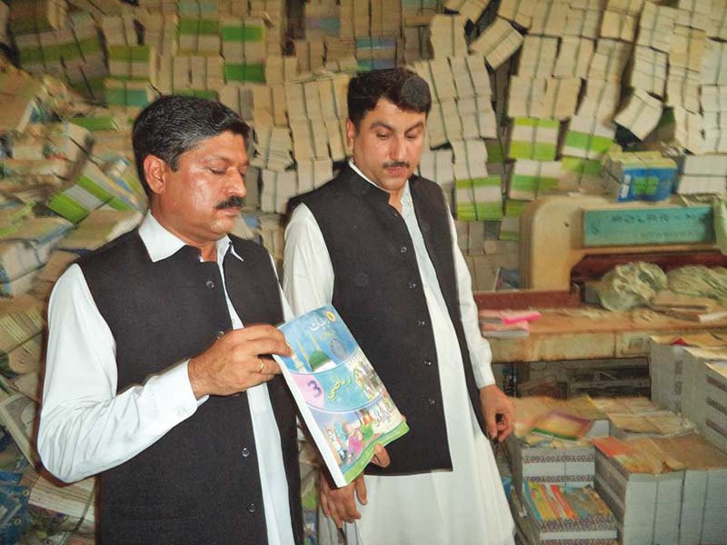 Officials of the anti-corruption establishment found a text book board’s warehouse filled to the brim with books meant to have been distributed to schools. PHOTO: EXPRESS