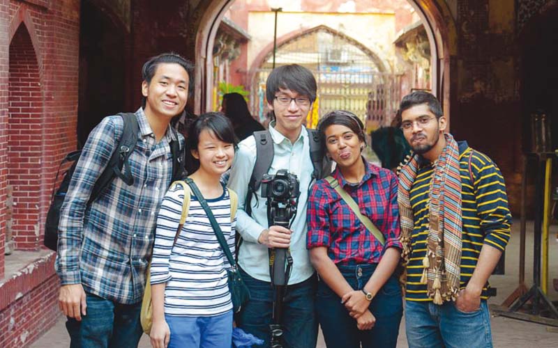 Jeremy Ho, Jemimah Seow, Andre He and Taahira Ayub with a local. PHOTOS: PUBLICITY