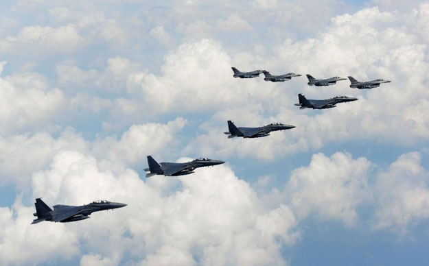 US and South Korean fighter jets fly over the Korean Peninsula, on August 22, 2015. PHOTO: AFP