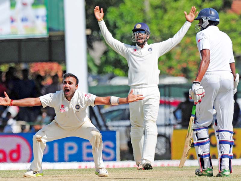 Leg-spinner Amit Mishra finished with four wickets, while seamers Ishant Sharma and Ashwin claimed two each. PHOTO: AFP