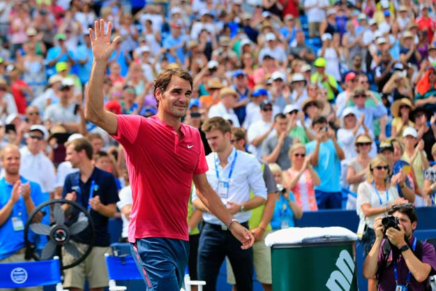 Roger Federer of Switzerland celebrates after defeating Novak Djokovic of Serbia to win the mens singles final at the Western & Southern Open at the Linder Family Tennis Center on August 23, 2015. PHOTO: AFP
