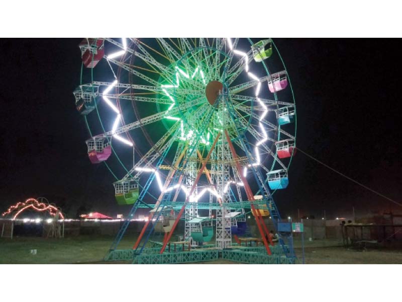 A Ferris wheel has been installed at the animal market on Super Highway along with a shisha cafe for the people coming to buy the animals. PHOTO: EXPRESS