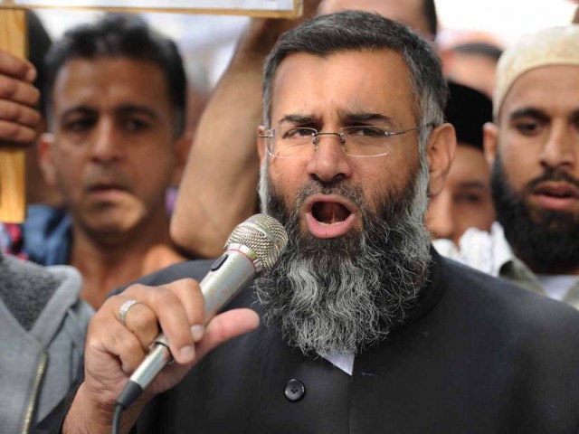 Muslim cleric Anjem Choudary speaks to a group of demonstrators outside the US embassy in central London. PHOTO: AFP