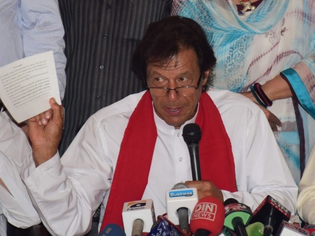 Imran Khan addresses a press conference in Lahore on October 8, 2015. PHOTO: WASEEM NIAZ/EXPRESS