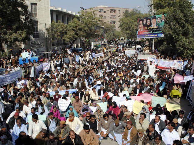 Members of Primary Teachers Association are chanting slogans against the Sindh Secretary Education in Hyderabad. PHOTO: PPI/FILE