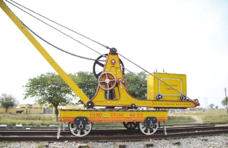 A riveted water tank still in use, a weighing machine, an antique telephone, a bogie-rescue crane, a steam engine, the economy waiting room turned into a museum, and the first-class waiting room. PHOTOS: HUMA CHOUDHARY