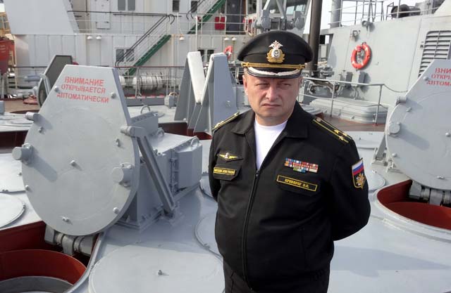 Russian Navy commander Oleg Krivorog stands on the deck of the Moskva cruiser as it patrols in the Mediterranean Sea, off the coast of Syria, on December 17, 2015. Russia began its air war in Syria on September 30, conducting air strikes against a range of anti-regime armed groups including US-backed rebels and jihadist groups. Moscow has said it is fighting and other "terrorist groups," but its campaign has come under fire by Western officials who accuse the Kremlin of seeking to prop up Syrian President Bashar al-Assad. PHOTO: AFP